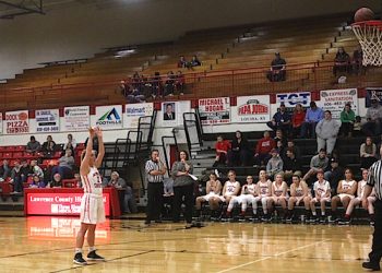 Lexi Ratliff hitting a free throw against Phelps after a technical foul was called.