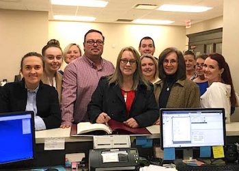 Robin Harmon Newsome posed for a photo with her husband Gene "Duke" Newsome and other family members as she signed up to run for Martin Co. Judge/Exec.