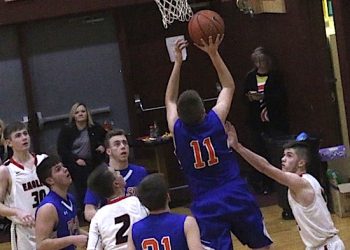 Tolsia's #11 Austin Salmons scoring two of his 27 points in a loss at Ambassador Christian