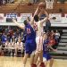 #23 Westin Hardin of LCHS going up strong as #11 Austin Salmons of THS defends.