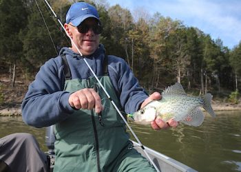 Tim Slone, retired director of the Information and Education Division of the Kentucky Department of Fish and Wildlife Resources, holds a black crappie caught from Taylorsville Lake. The increase in the minimum size limit to 10 inches for crappie on Taylorsville Lake is one of several new fishing regulations for 2018 that anglers must know before fishing this spring (Photo from Kentucky Afield)