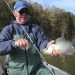 Tim Slone, retired director of the Information and Education Division of the Kentucky Department of Fish and Wildlife Resources, holds a black crappie caught from Taylorsville Lake. The increase in the minimum size limit to 10 inches for crappie on Taylorsville Lake is one of several new fishing regulations for 2018 that anglers must know before fishing this spring (Photo from Kentucky Afield)