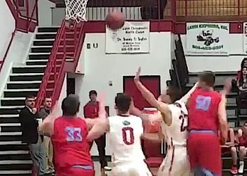 LC's # 23 Weston Hardin blocks out SC's 6'10" freshman center Trey James in action last night at Bulldog Arena. LC's #0 Chase Sartin and SC's #33 Eric Webb move in for position.