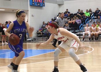Lady Bulldog 7th Grader Kensley Feltner putting the pressure on #3 Megan Frazier of Betsy Layne.