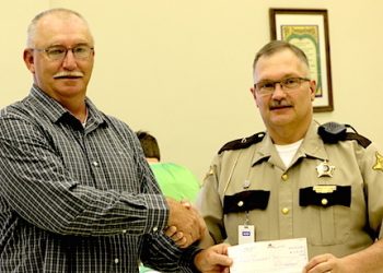 Lawrence Co. District 1 Constable Paul Wells with Sheriff Garrett Roberts. Wells is a trained deputy having served in that capacity on numerous occasions. He may be the only Lawrence Co. Constable who has such training. Roberts, up to now has not been in favor in granting more police power to the Constables, some of which are serving as guards in Lawrence County Schools as a safety precaution after the school shooting in Florida last week.