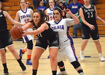 Mariah Finley playing defense vs Becca White of Tug Valley Monday night.