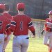 Peyton Cyrus is greeted by his teammates after hitting his third home run of the year Wednesday night at Floyd Central.