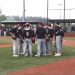 Lawrence Co. head coach Travis Feltner talking to his team between innings.