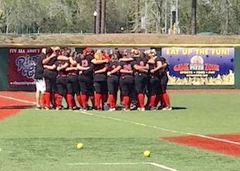 Lady Bulldogs getting last minute instructions and prayer before taking the field in Myrtle Beach.
