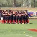 Lady Bulldogs getting last minute instructions and prayer before taking the field in Myrtle Beach.