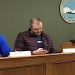 Louisa City Council members Ron Cordle (left) and Matt Brown were listening to mayor Harold Slone's presentation at last night's council meeting.