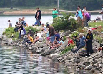 This pic of Kid's Fishing Day was taken in 2015. This is the 10th anniversary of the popular event.