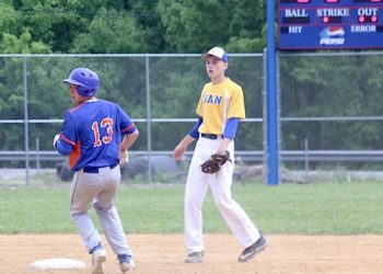 Jared Switzer looks back as he steals second base against Van in postseason play. Switzer stole 24 out of 25 bases this season.