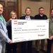 From left, Kentucky Power&rsquo;s Shawn Sumner and Linda Bevins present about $125,000 to Johnson County Schools Superintendent Thom Cochran, Director of Operations Tim Adams and Energy Manager Terry Salyer. The county earned the rebates for energy efficiency upgrades made at seven schools in 2017.