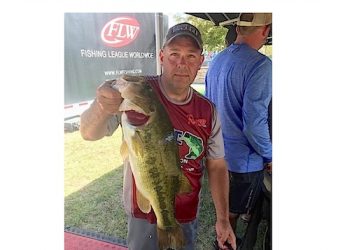 LAWRENCE COUNTY'S BJ NELSON HAS BEEN ON A TEAR THIS FISHING SEASON WITH HIS LATEST OUTING GETTING A 21ST PLACE IN THE NATION. HE IS HOLDING HIS BIGGEST CATCH OF THE TOURNEY.