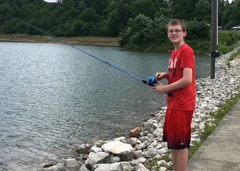 Kid's Fishing Day angler David Hueston,said, ” I’ve caught a couple of bass and a few crappie but now I’m trying to get me a catfish!”