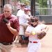 Mackenzie Methax makes a running catch in foul territory as the Pikeville first base coach tries to avoid contact.