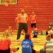 Lady Rebel Head Coach Ric Morrone talking to the kids during a short break Thursday at the Rebel Pride Camp