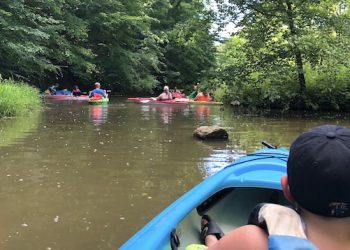 Kayakers relaxing in the shade up Greenbriar Creek