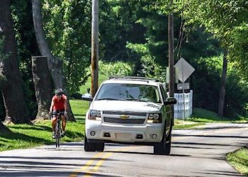 MOVE OVER FOR BIKES! The 3-foot requirement is measured from the outermost part of the vehicle, such as the passenger-side rearview mirror, to the bicyclist's left handlebar. Photo by Greg Eans, Messenger-Inquirer.com