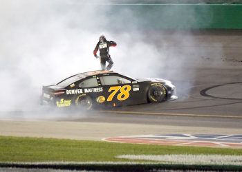 Martin Truex Jr. celebrates on top of the No. 78 Furniture Row Racing Toyota after winning the 2017 Quaker State 400 at Kentucky Speedway. With three wins already this year, Truex is again viewed as one of the race favorites. (photo by Randy Garvey).