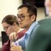 Epidemiologist Rui Zhao meets with others at Louisville Metro Health and Wellness. (Courier Journal photo by Marty Pearl)