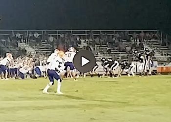 BULLDOGS BULLDOZE PAST  HAWKS IN KEY DISTRICT MATCHUP