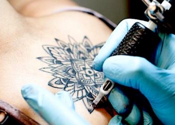 SAFETY ISSUES ARISE CONCERNING SOME TATTOOING OVER SCARS