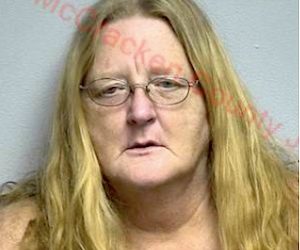 W. Ky. woman accused of dragging dog behind car, by high school and witnesses
