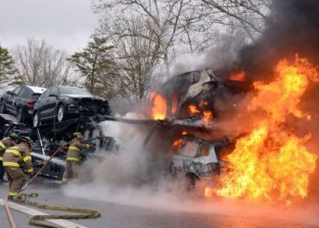 Semi truck hauling SUVs catches fire, three destroyed