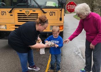 SCHOOL STAFF PITCHING IN TO FEED STUDENTS AT HOME