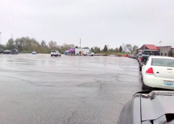 Lawrence citizens line up a mile for free food ‘DRIVE-THRU’ today (Thursday)