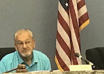 CARTER TALKS ASPHALT AT JULY COURT MEETING