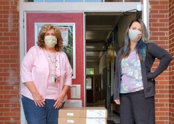 LOCAL BUSINESS CHIPS IN WITH TEN COMPUTERS AT LOUISA WEST