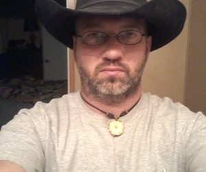 SON DIES WHILE PARENTS ESCAPE LOUISA HOUSE FIRE