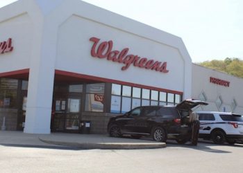 SHOELESS MAN HOLDS UP DRUG STORE BRANDISHING KNIFE