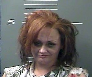 FLOYD COUNTY HUSBAND & WIFE STEAL AUTOMOBILE FROM LOUISA GAS STATION; LEAD POLICE ON VEHICLE CHASE