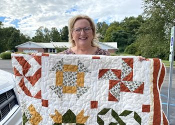 JANET MAY WINS SAMPLER QUILT IN LOUISA DAR CONTEST