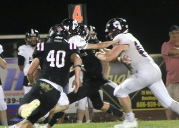 THREE BULLDOGS RUN FOR OVER 100 YARDS EACH AS LAWRENCE WINS PLAYOFF GAME