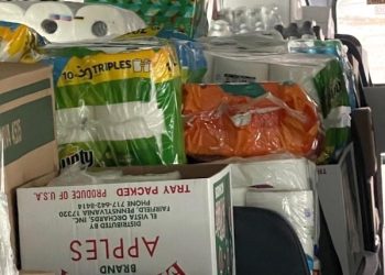 LAWRENCE CO. SENDS FIVE BUSSES OF GOODS TO TORNADO RAVAGED WEST KY.