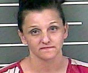 FLOYD CO. WOMAN IS ACCUSED OF SLASHING A MAN’S THROAT  FROM ‘EAR TO EAR’