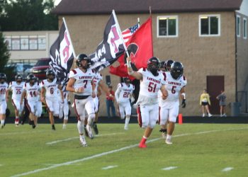 DEFENSE SHINES FOR LAWRENCE CO. IN DISTRICT OPENING WIN OVER MAGOFFIN CO.