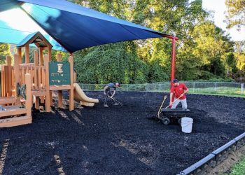 RAD DADS APPLY FINISHING TOUCHES TO REVITALIZED HEAD START PLAYGROUND   