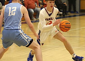 TOLSIA BLASTS MAN IN SECTION SHOWDOWN