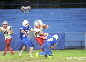 EVANS, REBELS RUN PAST HURLEY ON HOMECOMING NIGHT